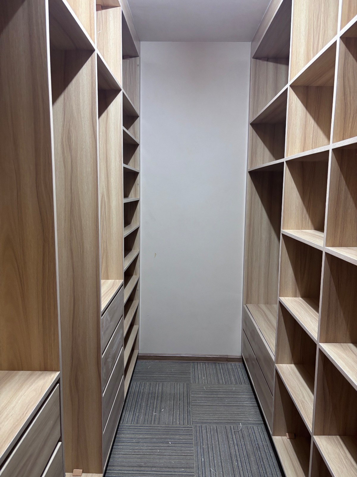 An image of a closet on both sides